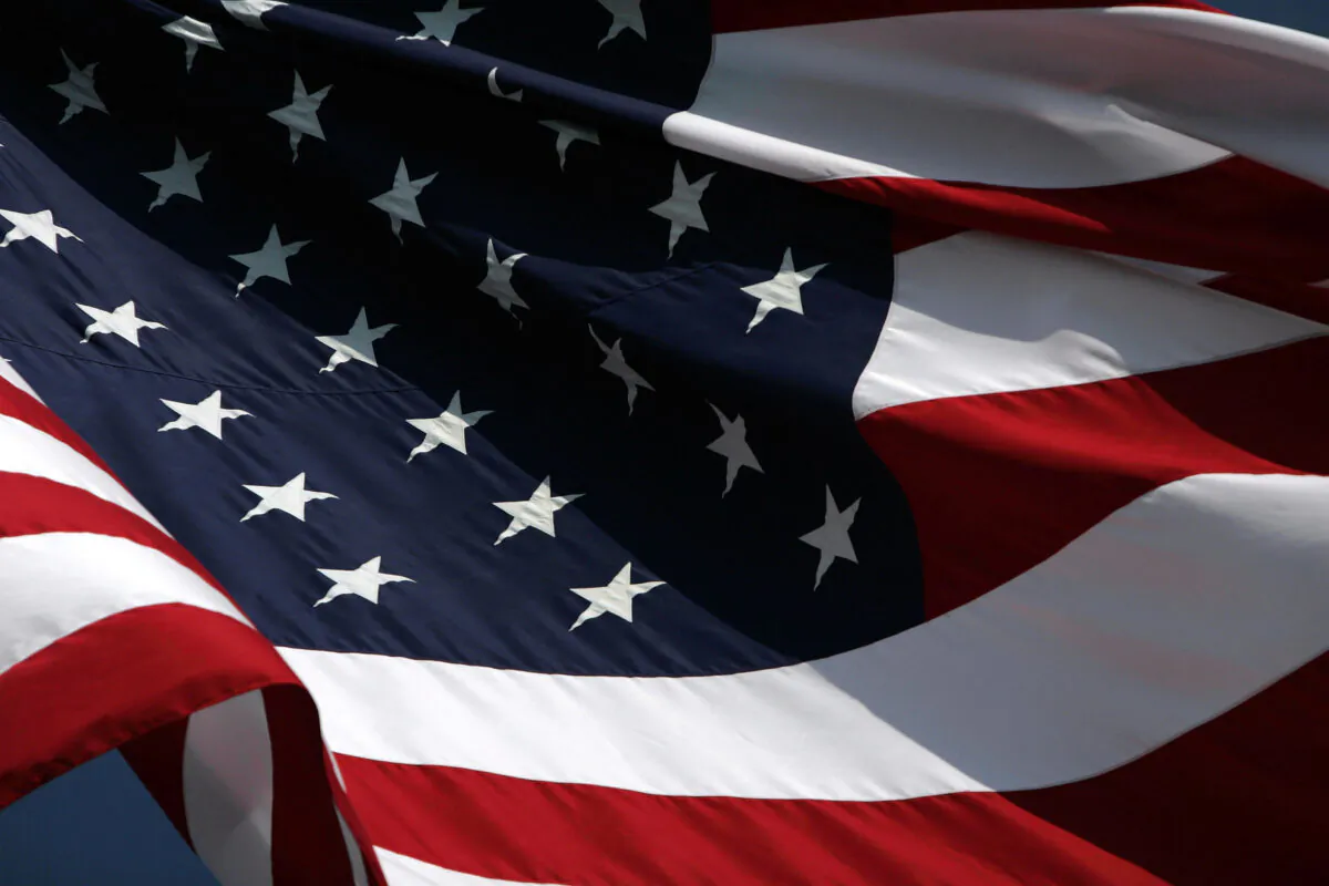 The American Flag waves in seen at Independence Stadium in Shreveport, Louisiana, on Sept. 17, 2005. (Ronald Martinez/Getty Images)