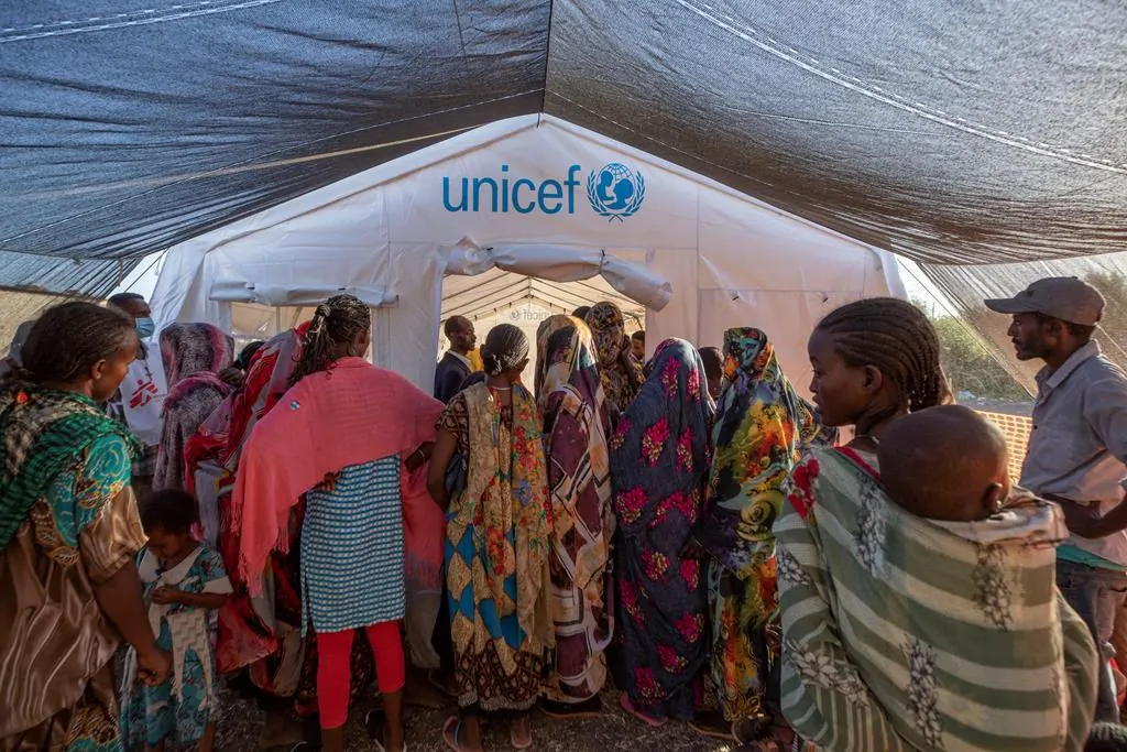 Tigray refugees who fled a conflict in the Ethiopia's Tigray region wait to receive treatment at a clinic run by MSF (Doctors Without Borders) near the Lugdi border crossing, eastern Sudan, on Dec. 8, 2020. (AP Photo/Nariman El-Mofty)
