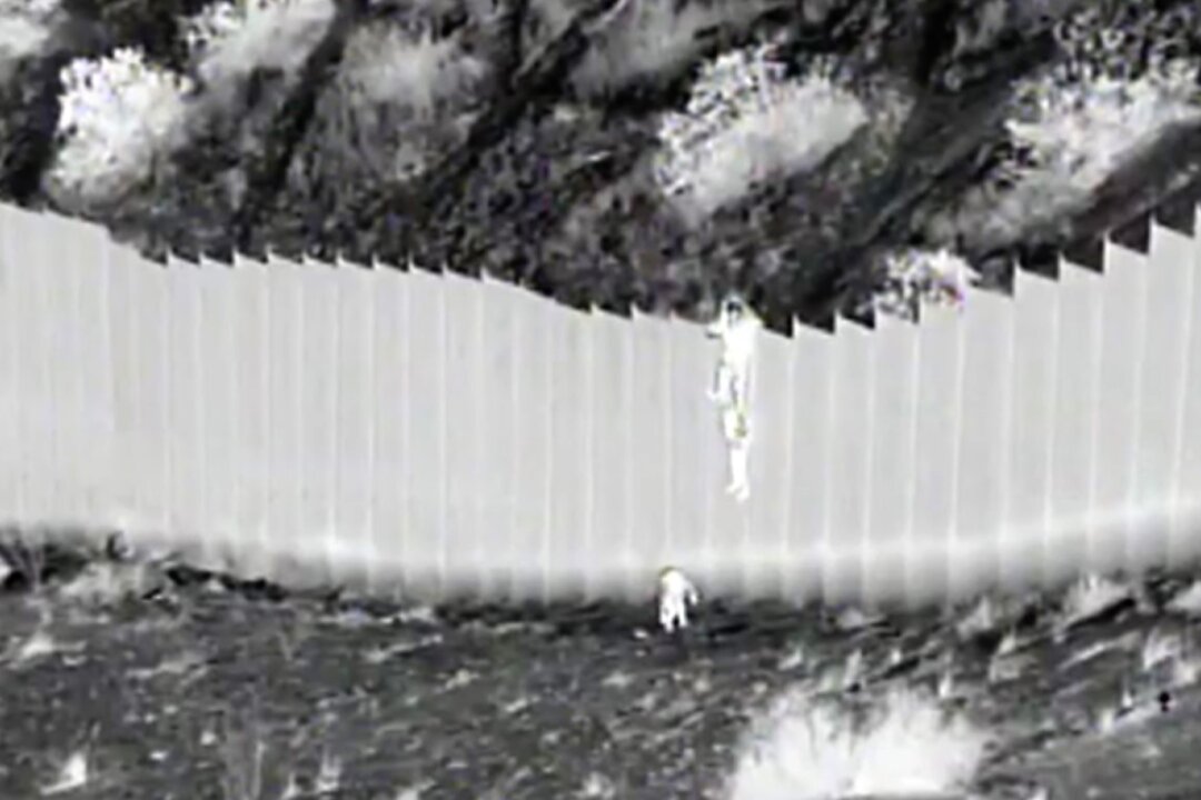 CBP Agent Rescues Sisters Dropped by Smuggler Over 14-Foot Border ...