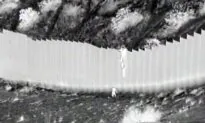 CBP Agent Rescues Sisters Dropped by Smuggler Over 14-Foot Border Barrier