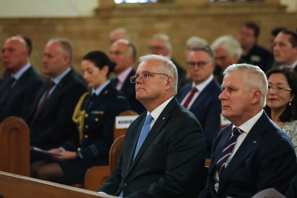 Prime Minister Scott Morrison and Deputy Prime Minister Michael McCormack attend a Parliamentary church service at the St Christopher's Catholic Cathedral in Manuka in Canberra, Australia on Feb. 2, 2021. (Dominic Lorrimer/Pool/Getty Images)