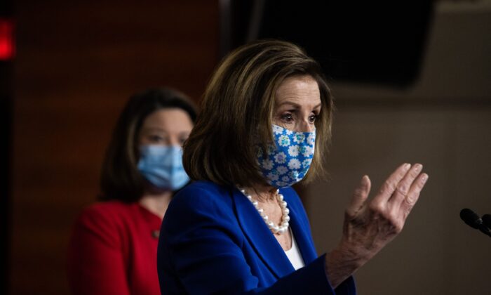 House Speaker Nancy Pelosi (D-Calif.) speaks to reporters on Capitol Hill in Washington on March 19, 2021. (Graeme Jennings/Pool/AFP via Getty Images)