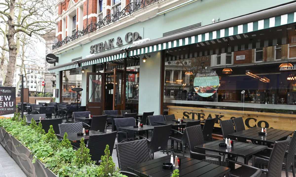 A picture shows empty outdoor seating at lunchtime at a restaurant in central London on March 17, 2020. (Justin Tallis /AFP via Getty Images)