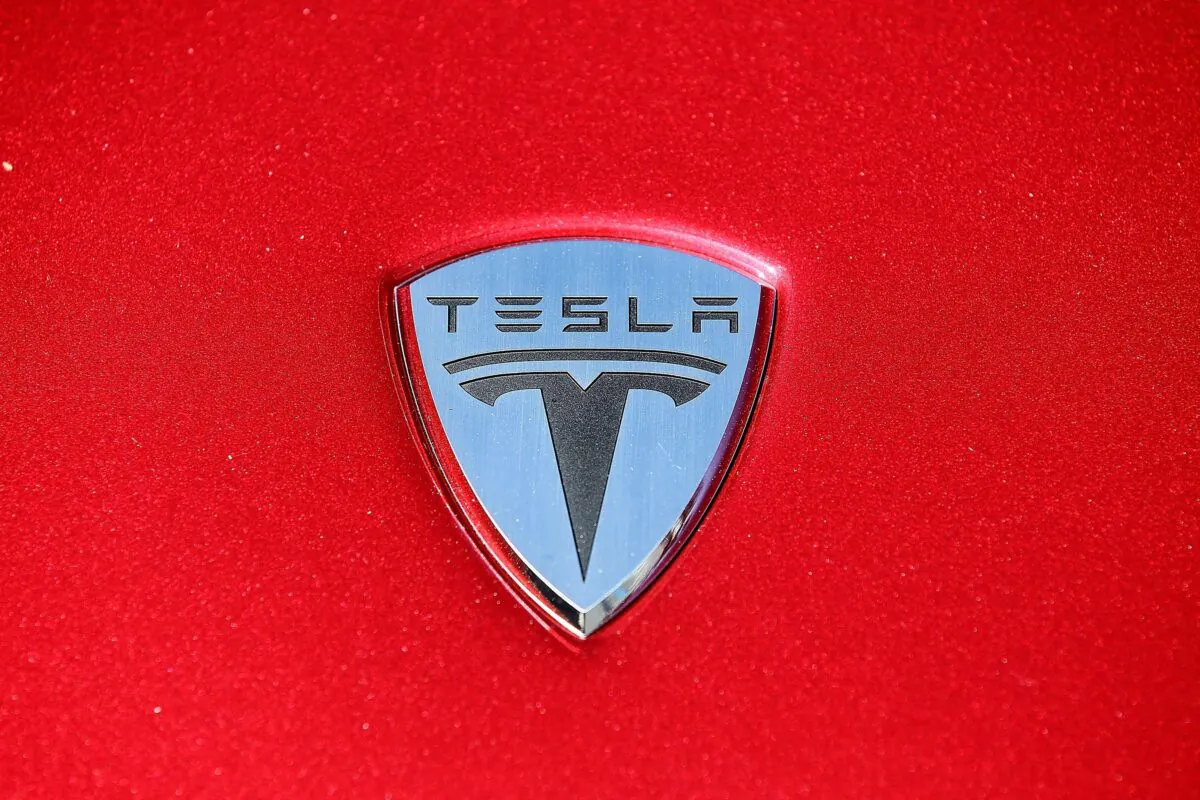 The Tesla Motors logo is seen on the hood of a car at Tesla Motors headquarters, in Palo Alto, Calif., on May 20, 2010. (Justin Sullivan/Getty Images)