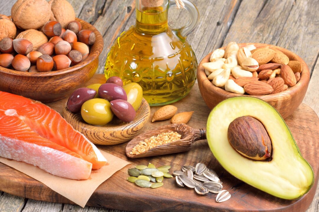 Avocado, olive oil, legumes, whole grains, nuts, seeds, fruits, and veggies are anti-inflamma- tory foods with healthy cholesterol. (Craevschii Family/Shutterstock)