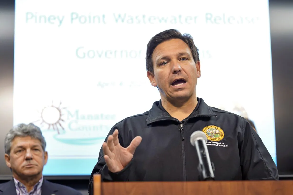 Florida Gov. Ron DeSantis gestures during a news conference at the Manatee County Emergency Management office in Palmetto, Fla., on April 4, 2021. (Chris O'Meara/AP Photo)