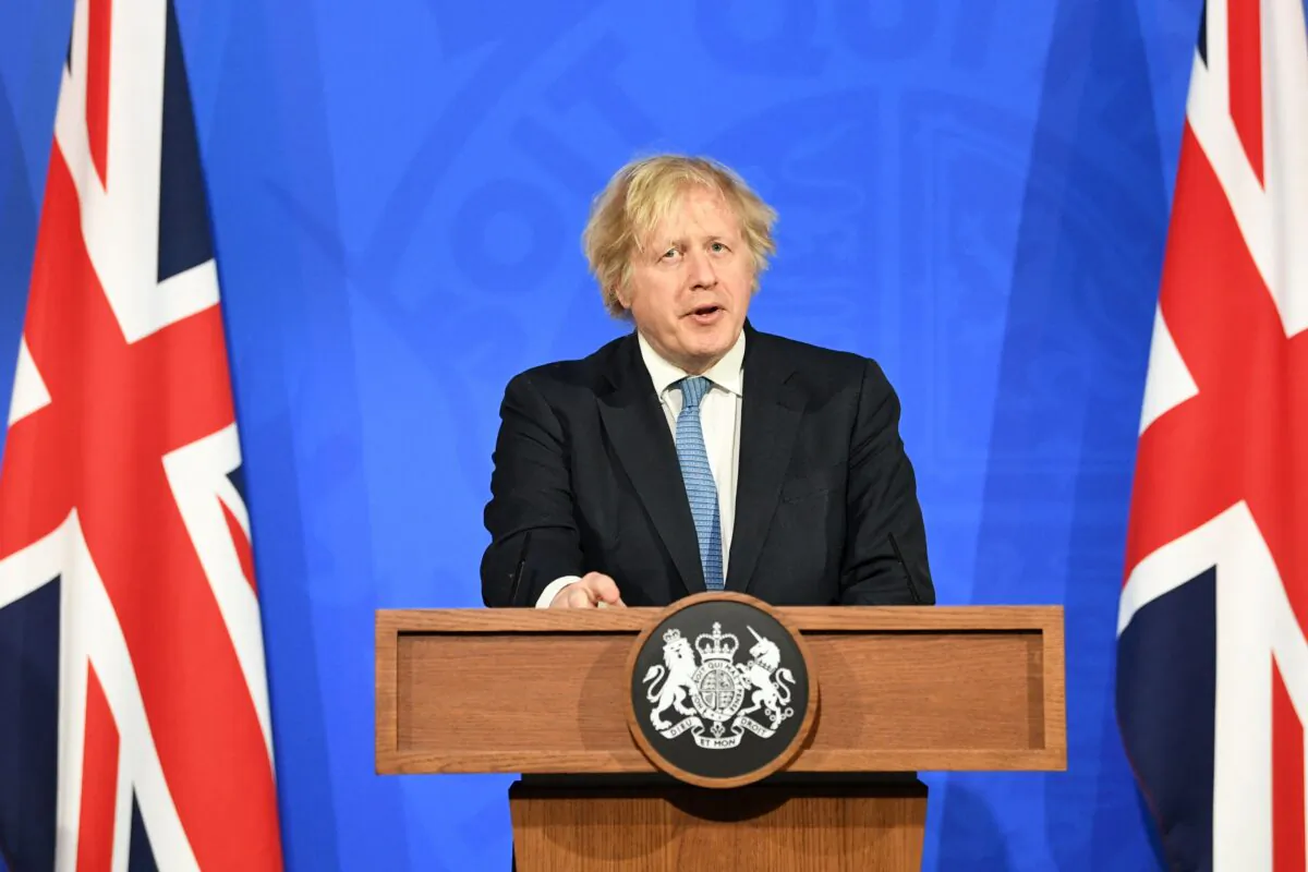 U.K. Prime Minister Boris Johnson gives a virtual press conference inside the Downing Street briefing room in London on April 5, 2021. (Stefan Rousseau/Pool/AFP via Getty Images)