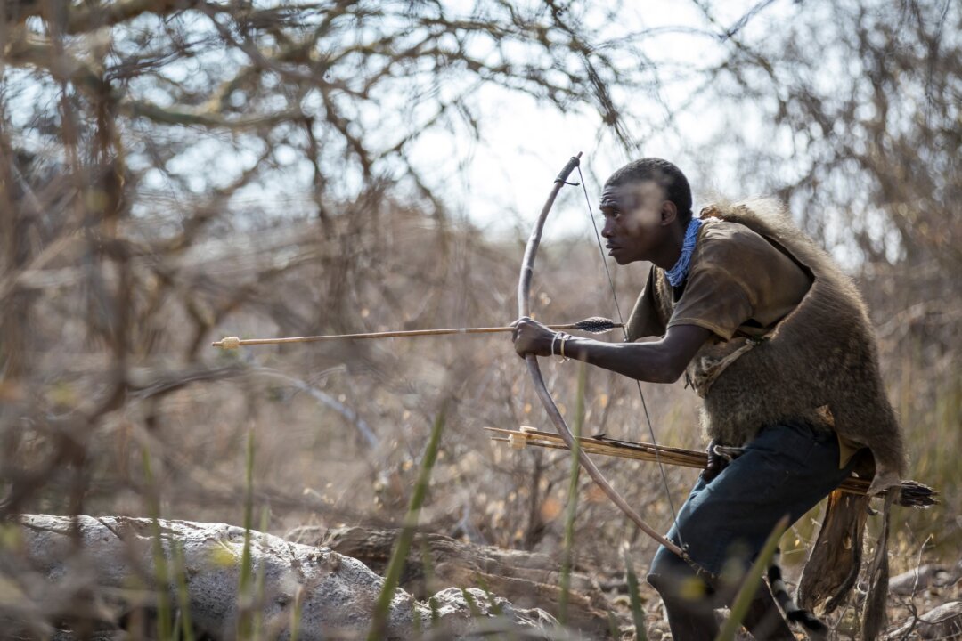 Hadzabe hunter in the nature of norther Tanzania. (Katiekk/Shutterstock)