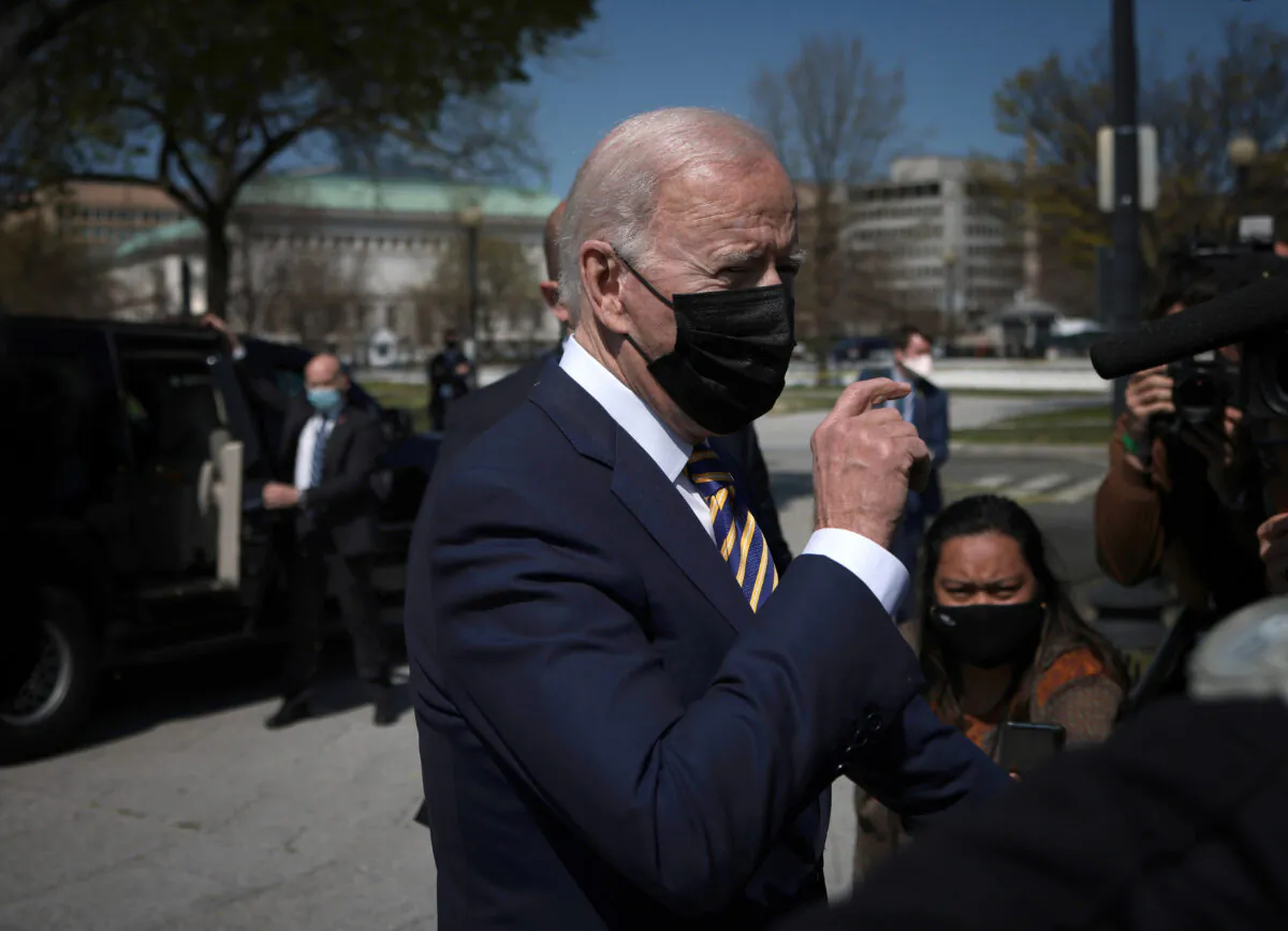 President Joe Biden answers questions while returning to the White House in Washington on April 5, 2021. (Win McNamee/Getty Images)