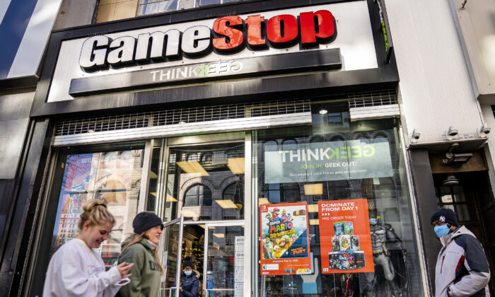 Pedestrians pass a GameStop store on 14th Street at Union Square, in the Manhattan borough of New York on Jan. 28, 2021. (John Minchillo/AP Photo)