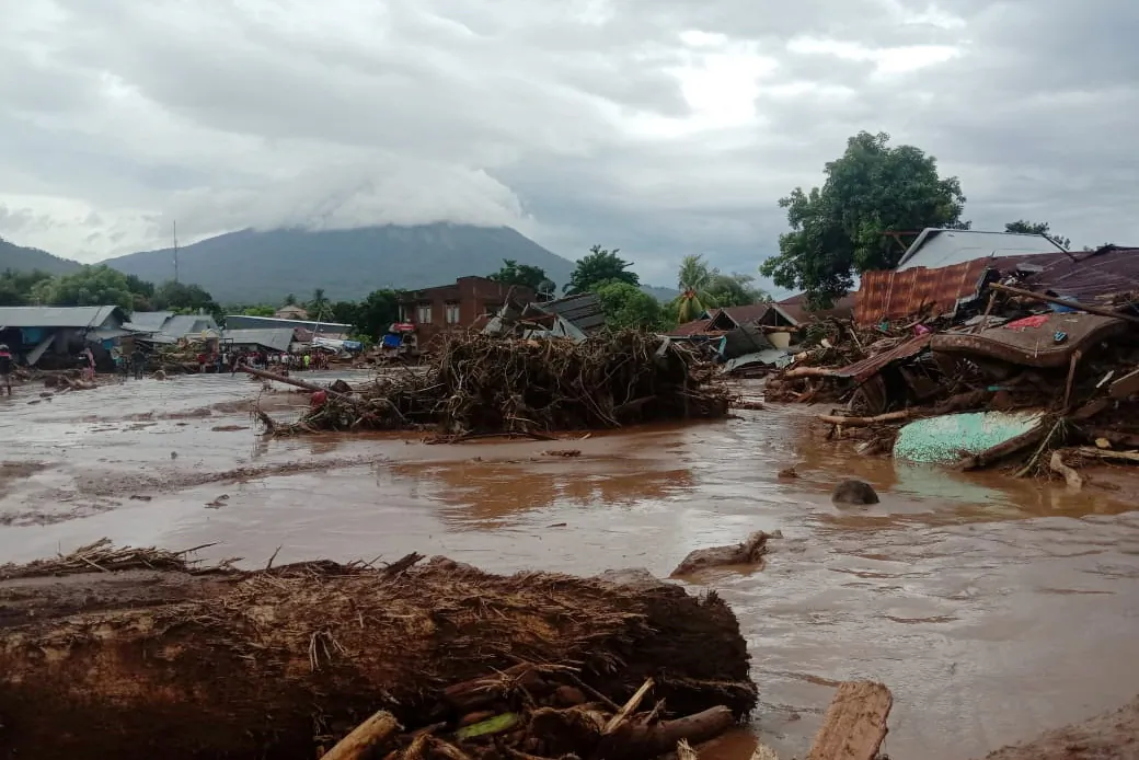 Damaged houses are seen at an area affected by flash floods after heavy rains in East Flores, East Nusa Tenggara province, Indonesia on April 4, 2021. (Antara Foto/Handout/Dok BPBD Flores Timur/via Reuters)