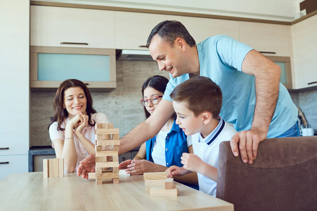 Game night is a classic and provides hours of fun. (Studio Romantic/Shutterstock)
