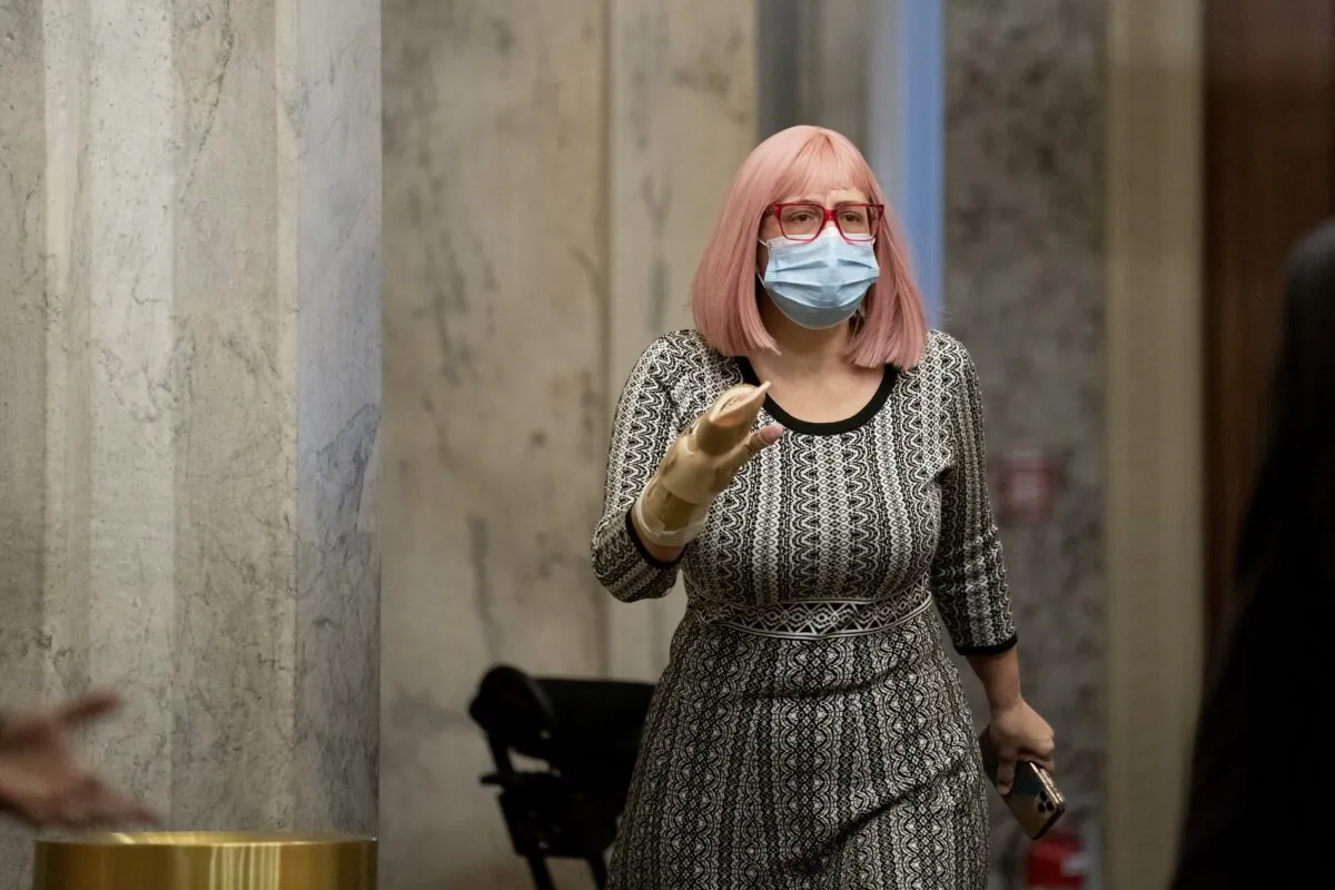 Sen. Kyrsten Sinema (D-Ariz.) walks on Capitol Hill in Washington on Dec. 11, 2020. (Stefani Reynolds/Getty Images)