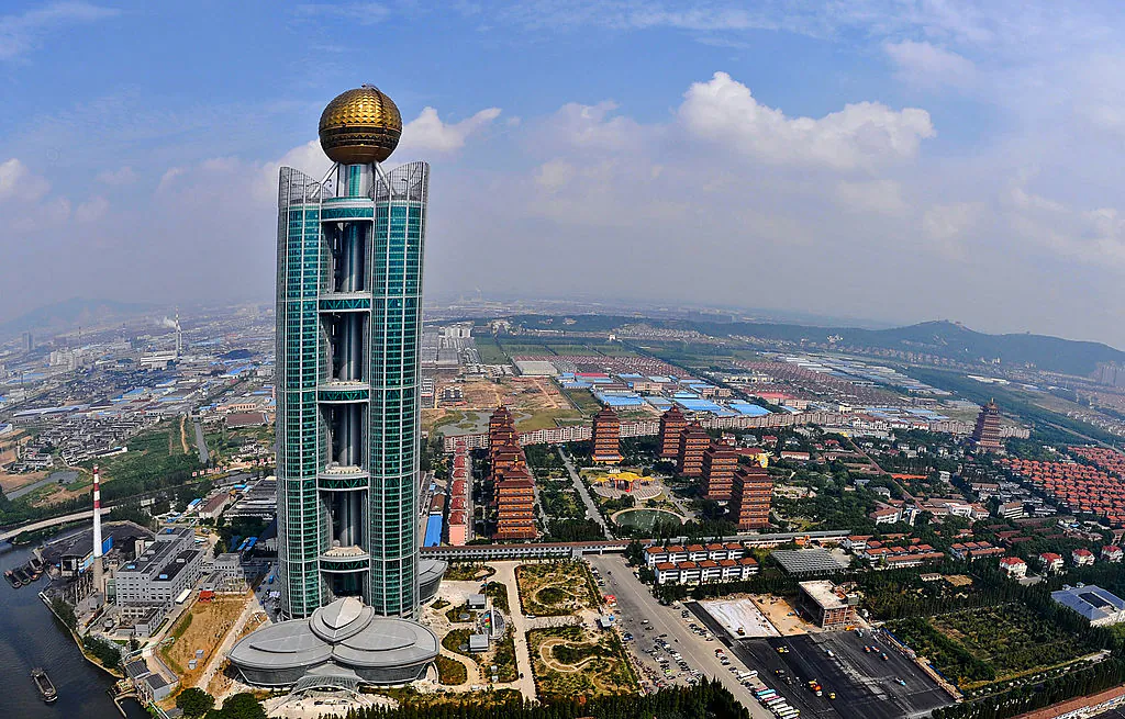 One of China's tallest buildings, the $470 million Longxi International Hotel, touted by Chinese officials as a symbol of China's economic growth, stands at 328 metres (1,082-feet) high in Huaxi, Jiangsu province, on Sept. 25, 2011. (AFP via Getty Images)