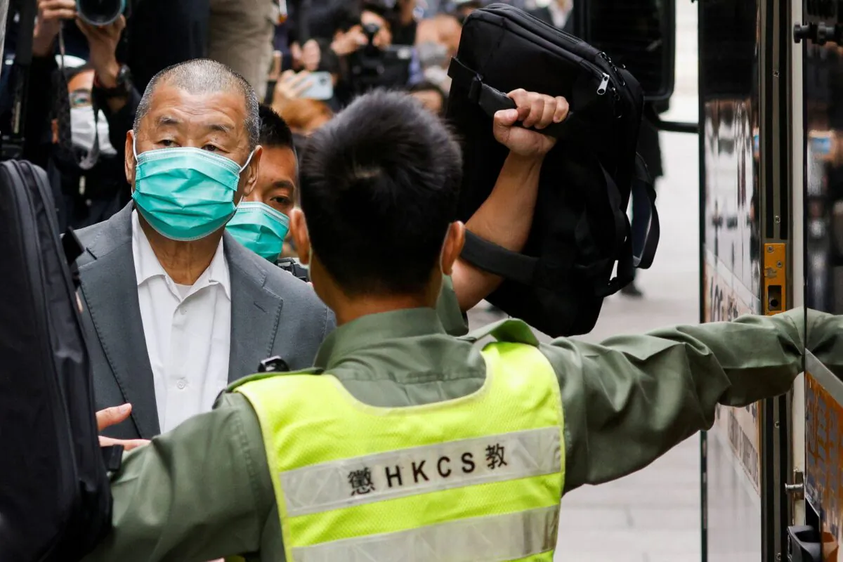 Media mogul Jimmy Lai, founder of Apple Daily, leaves the Court of Final Appeal by prison van in Hong Kong, China on Feb. 9, 2021. (Tyrone Siu/File Photo via Reuters)