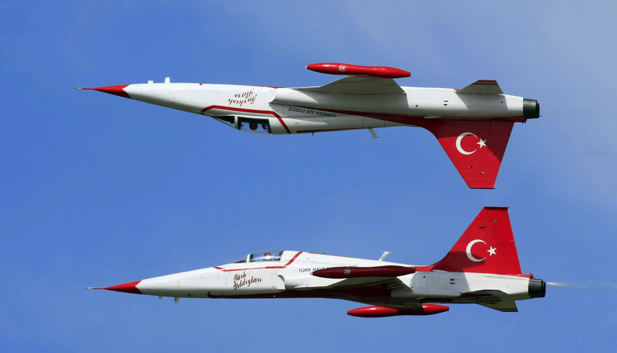 Members of Turkish Stars display team present their exercise with their NF-5 type aircraft in a file photo. (Viktkor Veres/AFP via Getty Images)