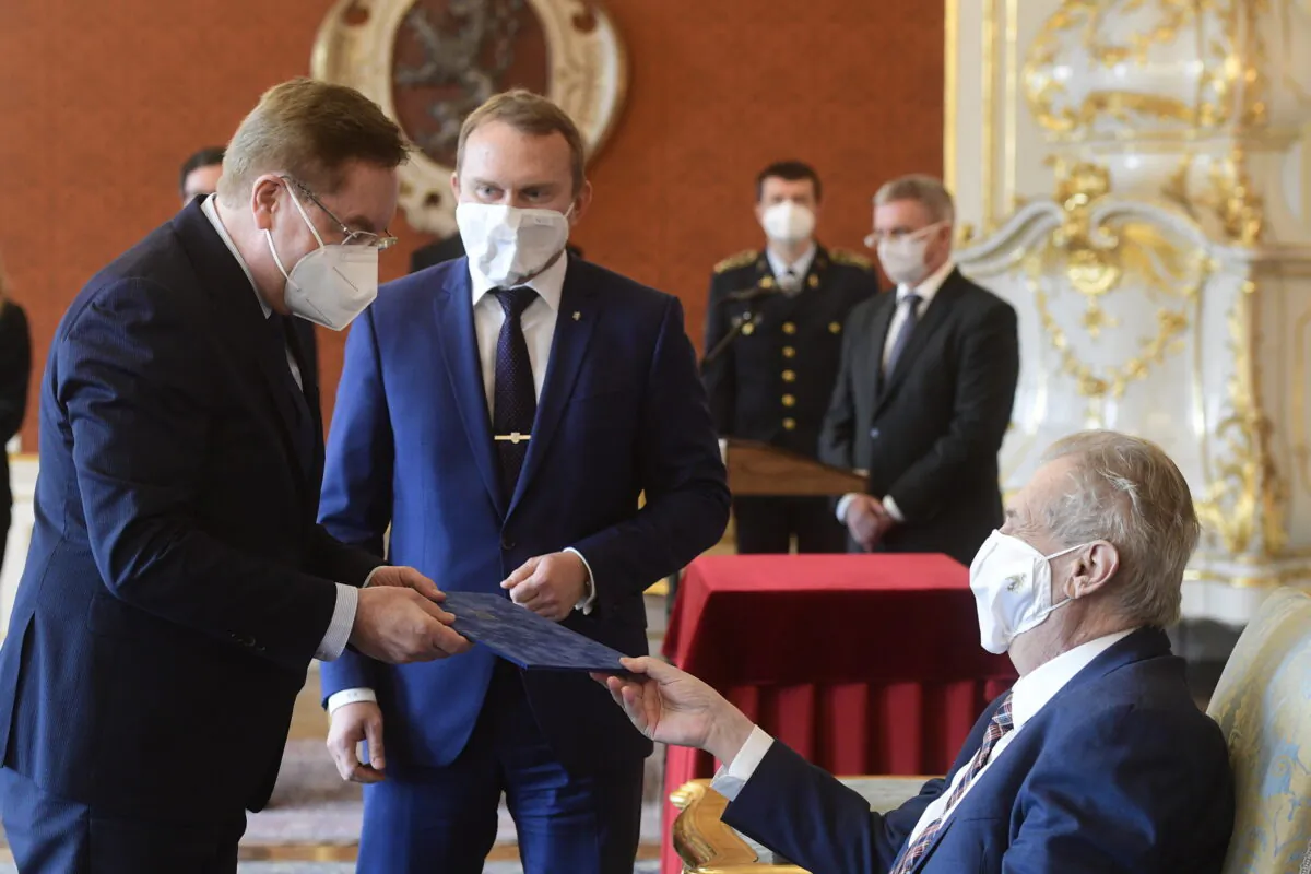 Czech president Milos Zeman (R) appoints Petr Arenberger (L) as the new Czech health minister in Prague, Czech Republic, on April 7, 2021. (Roman Vondrous/CTK via AP)