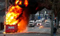UK PM Urges Calm as Belfast Protesters Hijack Bus, Attack Police