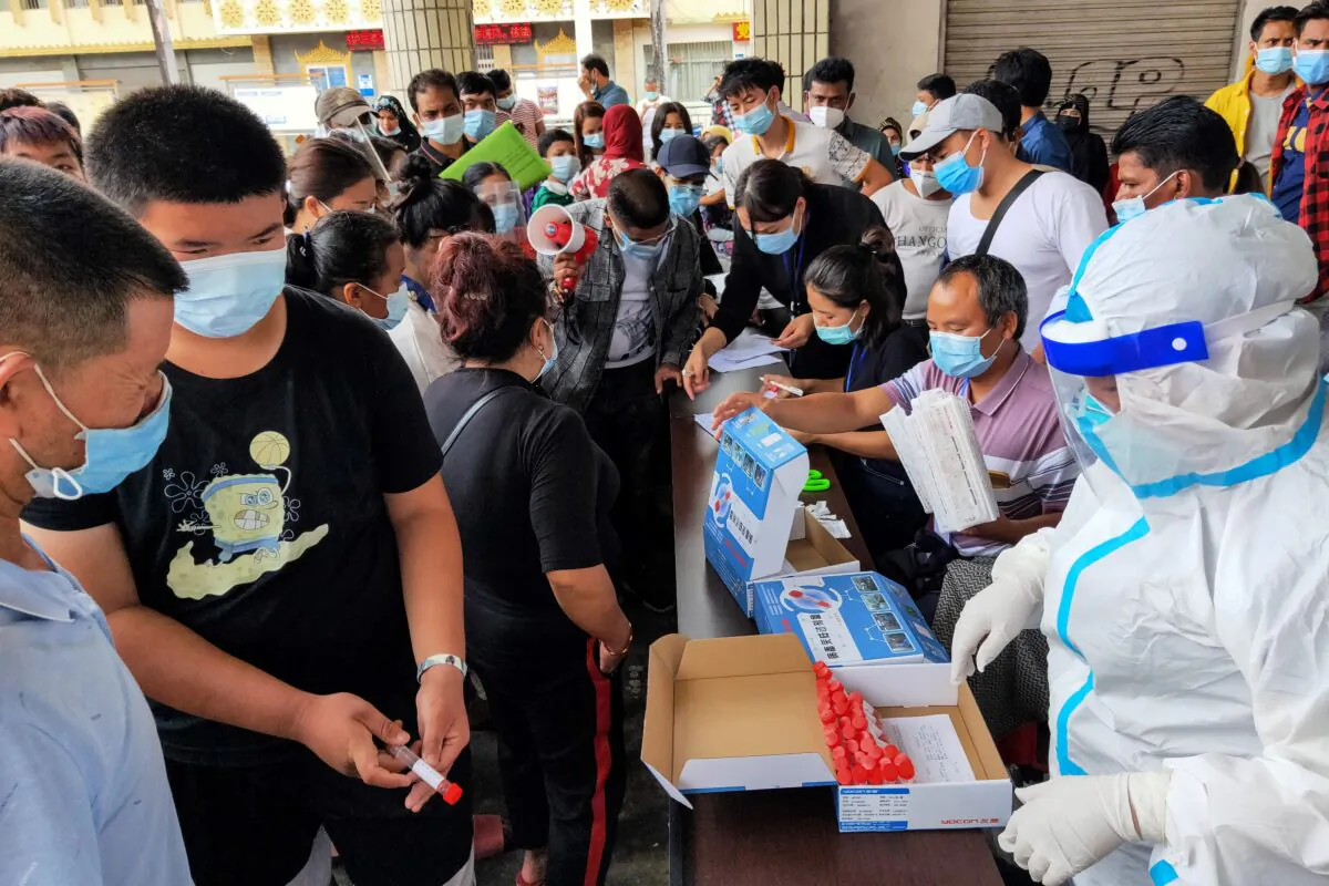 Residents receive COVID-19 testing in Ruili, southeastern China's Yunnan Province on Sept. 15, 2020. (STR/AFP via Getty Images)