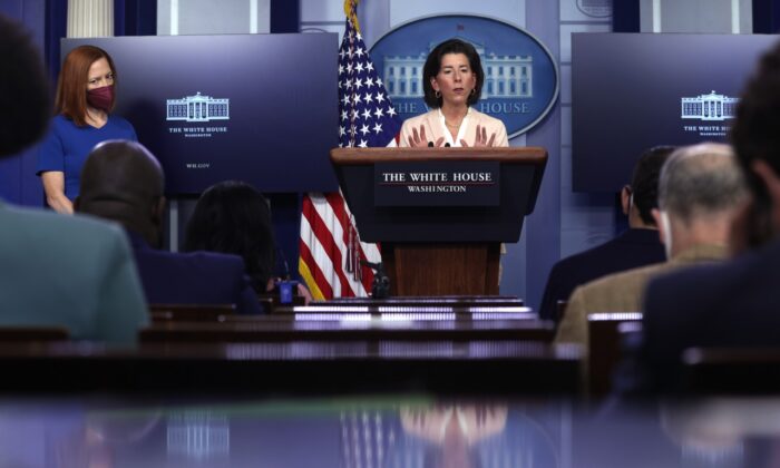 U.S. Secretary of Commerce Gina Raimondo speaks as White House Press Secretary Jen Psaki looks on during a daily press briefing at the James Brady Press Briefing Room of the White House April 7, 2021 in Washington. (Alex Wong/Getty Images)