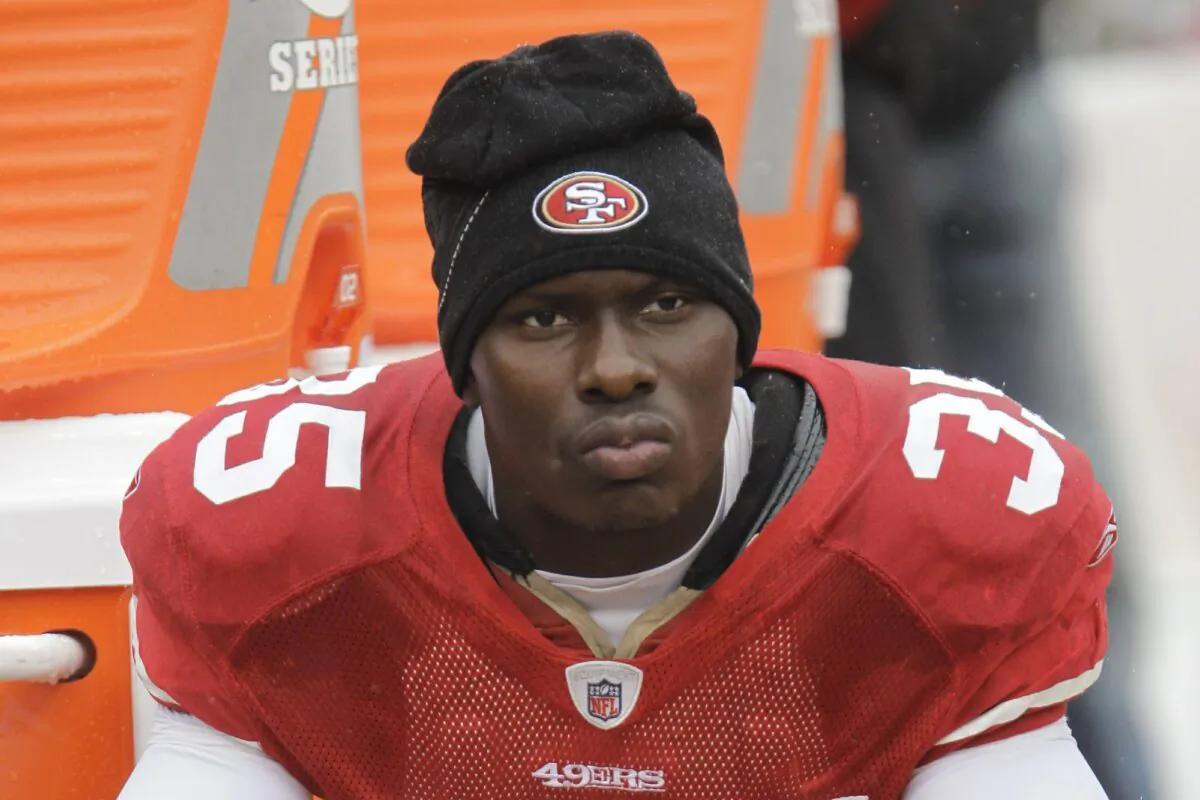 San Francisco 49ers cornerback Phillip Adams sits on the sideline during the first quarter of an NFL football game in San Francisco, Calif., on Oct. 17, 2010. (Paul Sakuma/File Photo via AP)