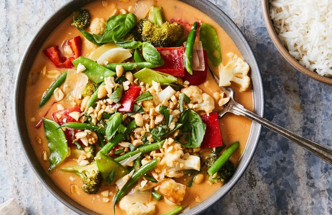 This colorful, vegetable-packed curry is best served with warm long-grained rice. (Ty Mecham/TNS)