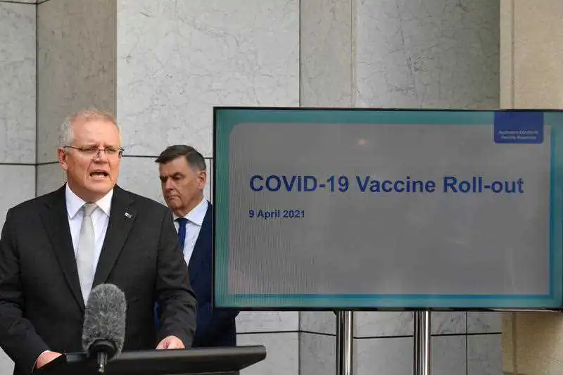 Prime Minister Scott Morrison and Department of Health Secretary Brendan Murphy at a press conference at Parliament House in Canberra. Friday, April 9, 2021. (AAP Image/Mick Tsikas) 