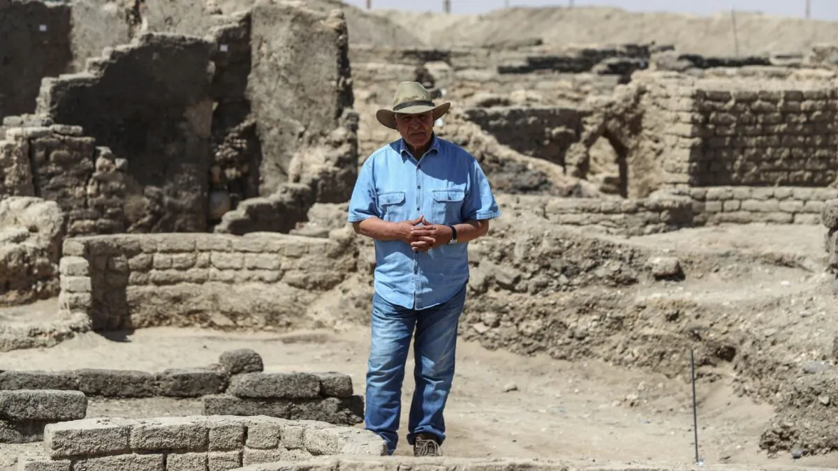 Dr. Zahi Hawass talks to media in a 3,000-year-old lost city in Luxor province, Egypt, on April 10, 2021. (Mohamed Elshahed/AP Photo)