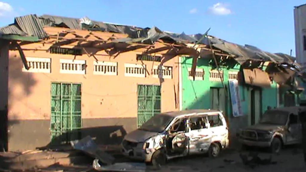 Destroyed buildings and vehicles after twin explosions in the Somali city in Baidon on Feb. 28, 2016. (AFP via Getty Images)