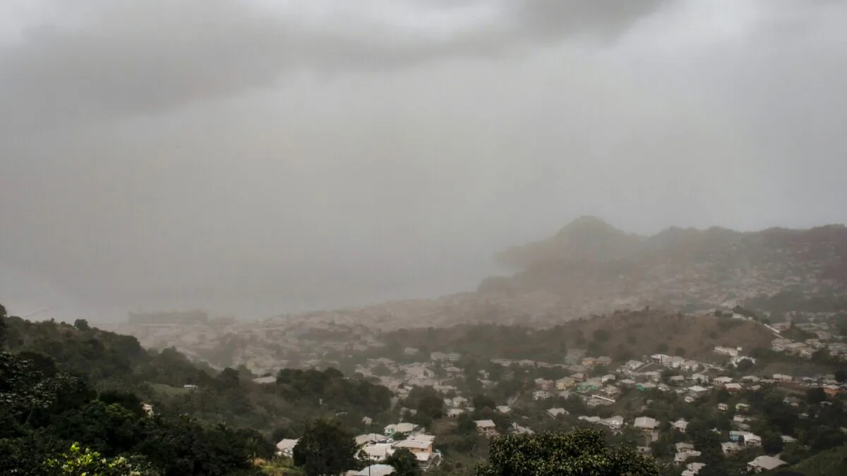 A cloud of volcanic ash hovers over Kingstown, on the eastern Caribbean island of St. Vincent, on April 10, 2021, a day after the La Soufriere volcano erupted. (Lucanus Ollivierre/AP)