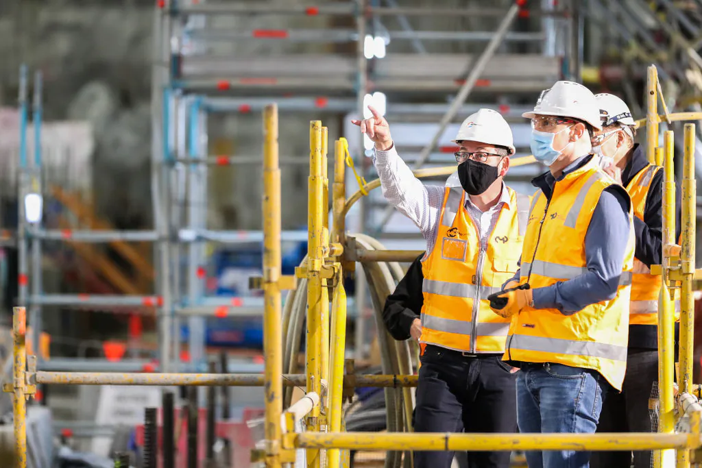 Premier of Victoria Daniel Andrews points as he inspects the underground site of the currently being built, State Library station, as part of the Metro Tunnel metropolitan rail infrastructure project on Nov. 6, 2020 in Melbourne, Australia. (Asanka Ratnayake/Getty Images)