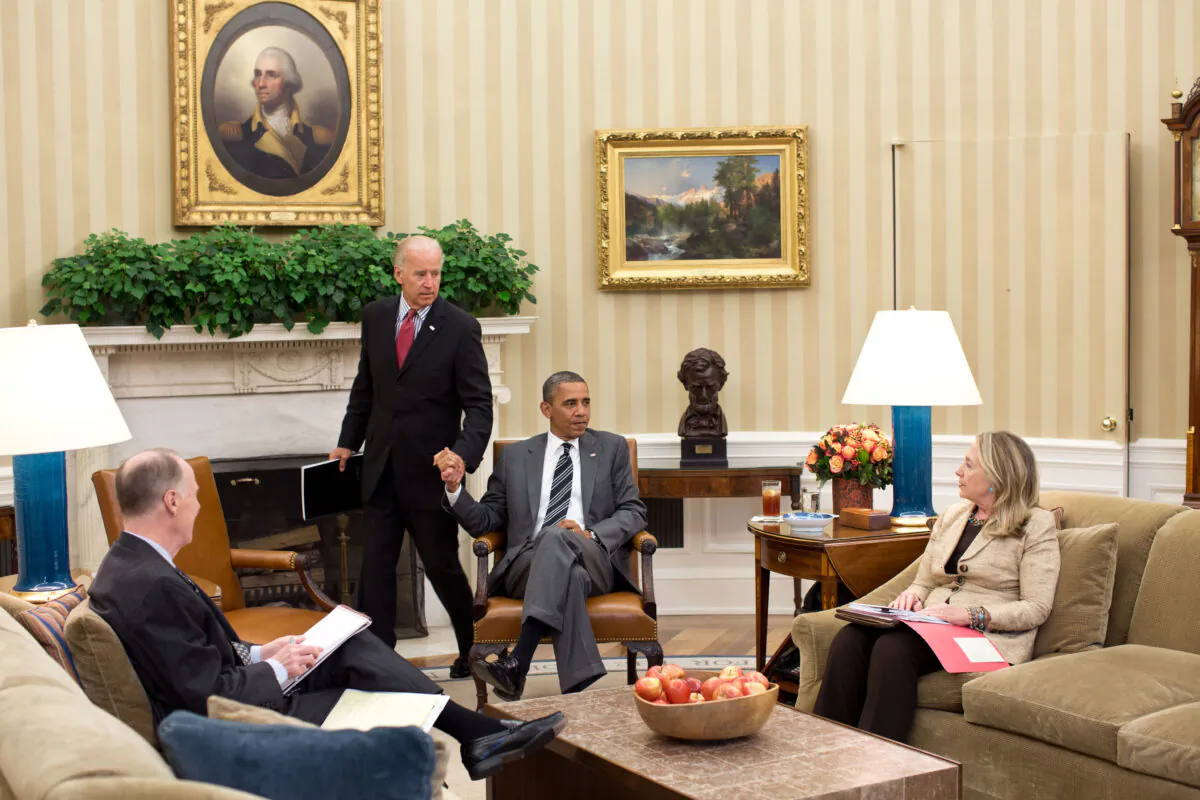 Vice President Joe Biden (Center L) arrives for a meeting with President Barack Obama, Secretary of State Hillary Clinton, and National Security Adviser Tom Donilon in the Oval Office in Washington on July 18, 2012. (Pete Souza/White House Photo via Getty Images)