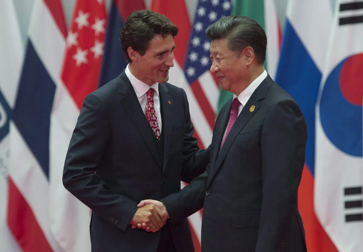 Canadian Prime Minister Justin Trudeau is greeted by Chinese leader Xi Jinping during the official welcome at the G20 Leaders Summit in Hangzhou, China, on Sept. 4, 2016. (Adrian Wyld/The Canadian Press)