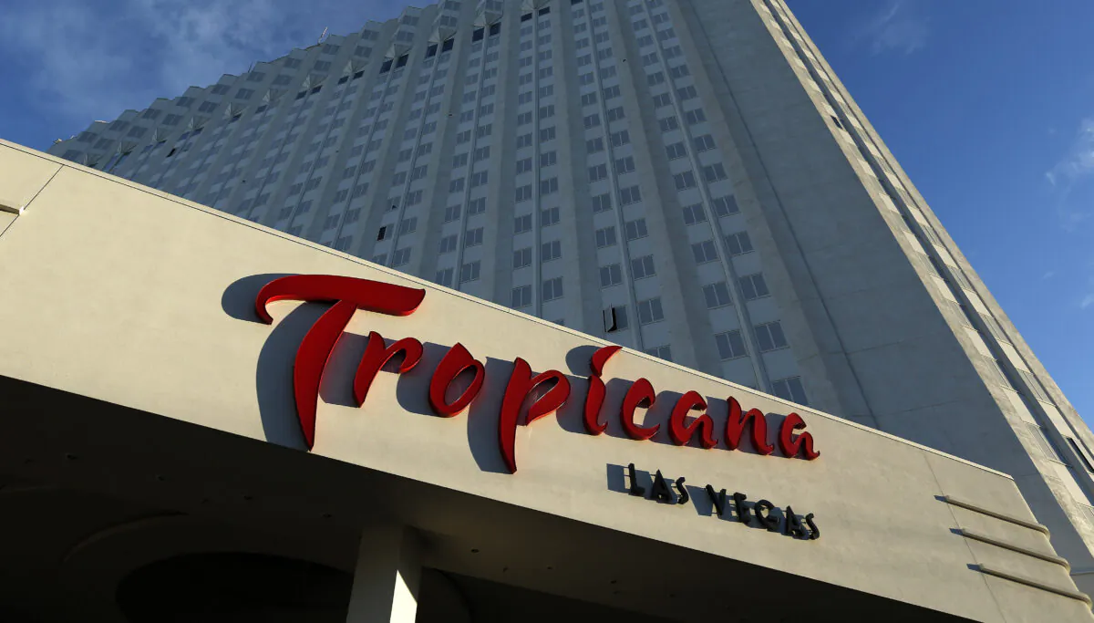 Sunlight illuminates a sign at the Tropicana hotel and casino in Las Vegas, Nev., on Aug. 4, 2015. (John Locher/AP Photo)