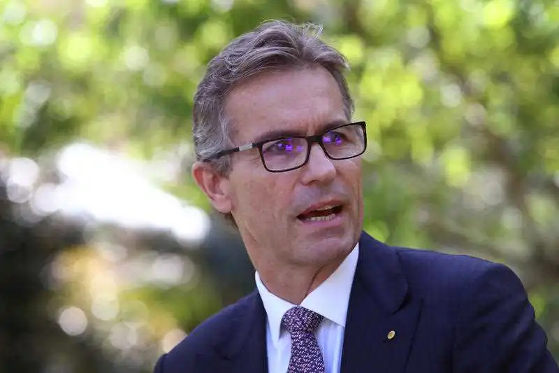 Former University of Queensland Vice-Chancellor Peter Hoj speaks during a press conference at the University of Queensland in Brisbane, March 22, 2020. (AAP Image/Jono Searle) 