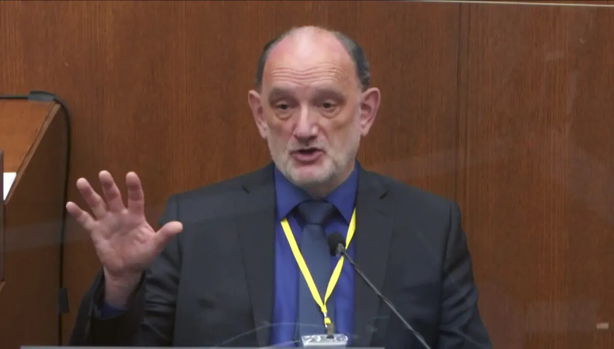 Dr. David Fowler, a retired forensic pathologist and former chief medical examiner for the state of Maryland, testifies in the trial of former Minneapolis police Officer Derek Chauvin at the Hennepin County Courthouse in Minneapolis,  Minn., on April 14, 2021. (Court TV via AP, Pool)