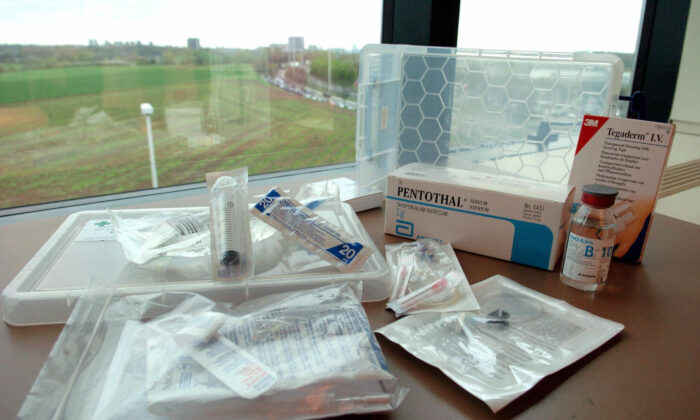 A euthanasia kit available in the 250 Belgian Multipharma's chemist shops for the general practitioners who want to practice euthanasia at the patients' homes, in Brussels on April 18, 2005. (Etienne Ansotte/AFP via Getty Images)