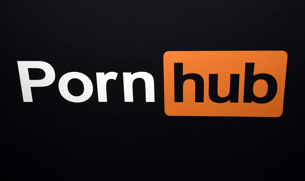 A Pornhub logo is displayed at the company's booth at an expo in Las Vegas on Jan. 24, 2018. (Ethan Miller/Getty Images)