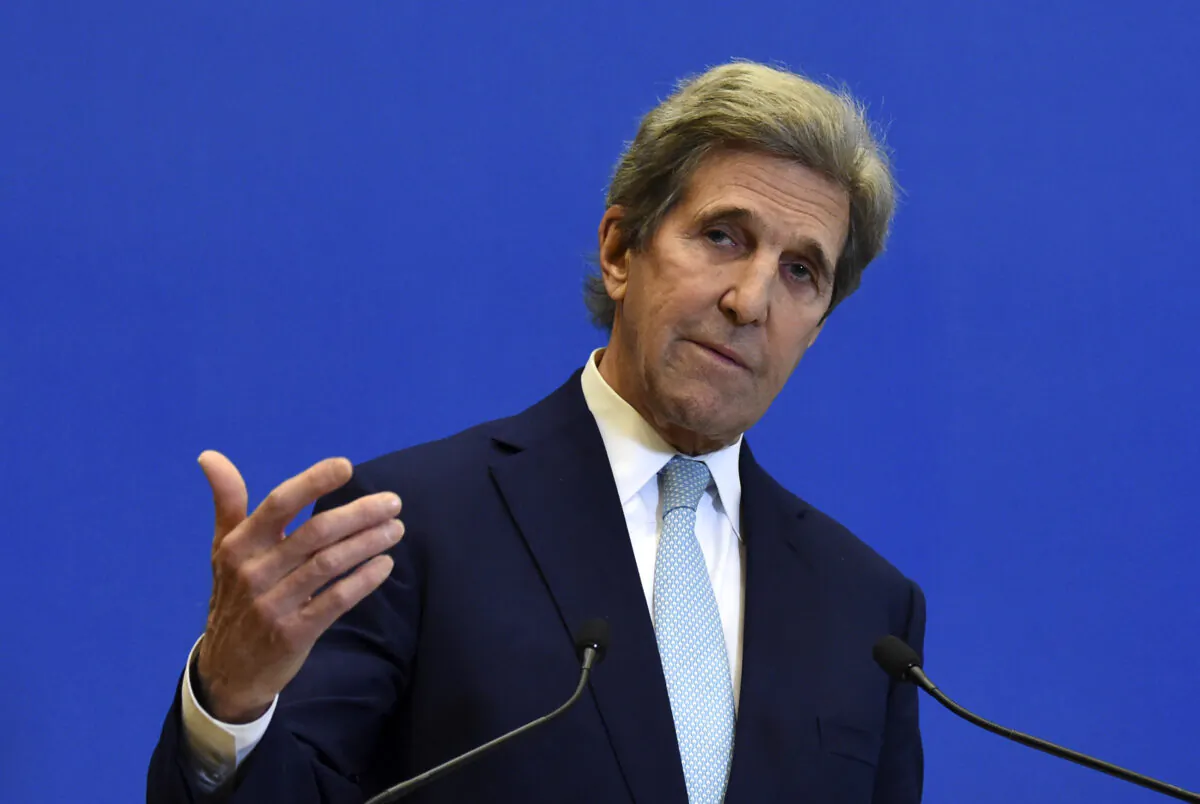 U.S. Special Presidential Envoy for Climate John Kerry gestures as he addresses a press conference after a meeting with France's Economy and Finance Minister at The Ministry of Economy in Paris, France, on March 10, 2021. (Eric Piermont/AFP via Getty Images)