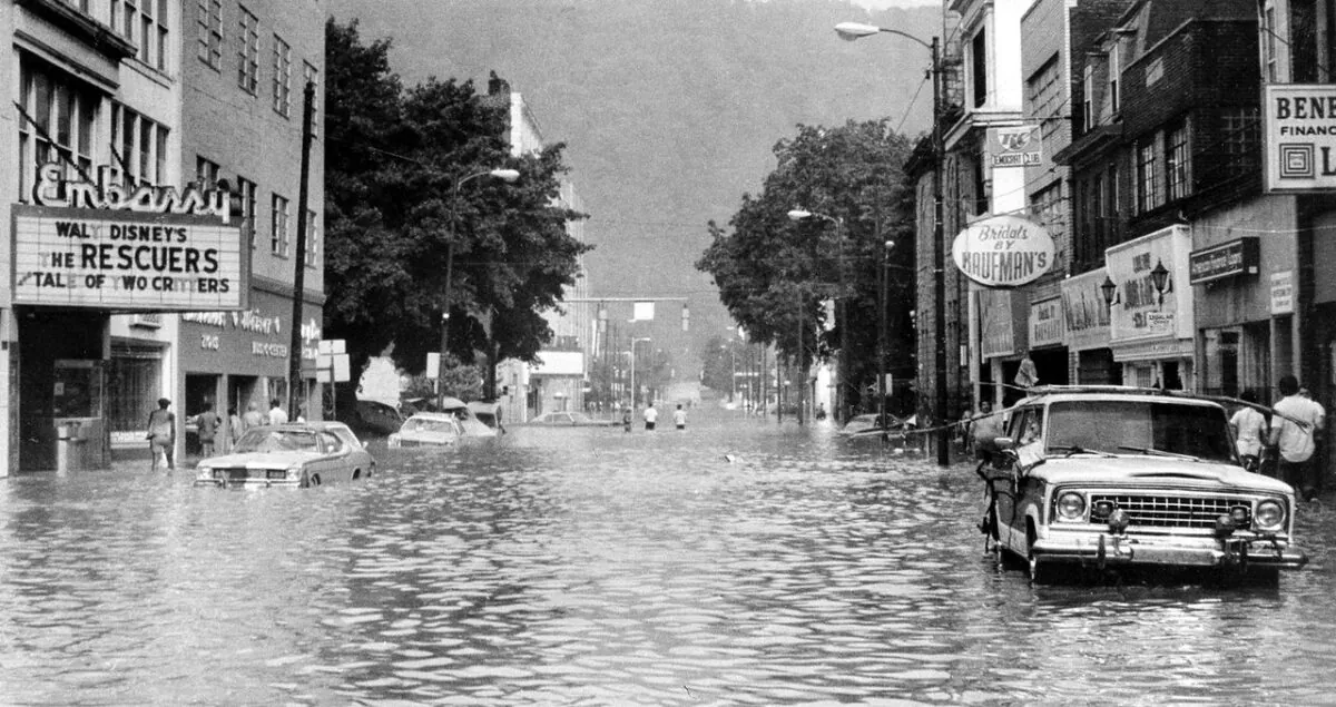 This is a general view of Main Street in downtown Johnstown, Pa., Wednesday morning, July 20, 1977 after floodwaters began to recede. Heavy rain and the breaking of a dam caused the city to be flooded. (AP Photo)