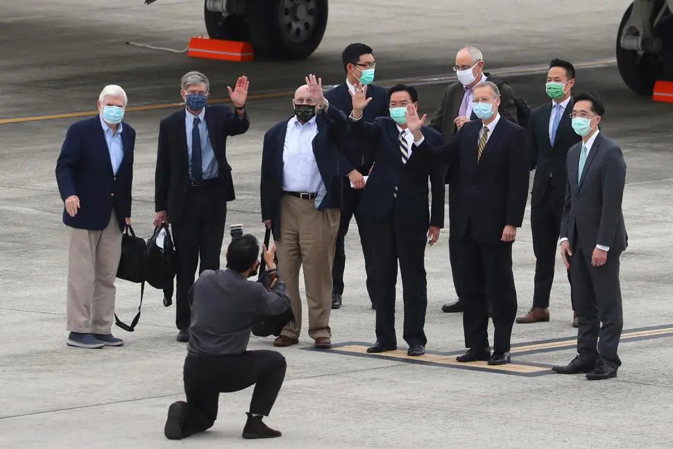 From left, former U.S. senator Chris Dodd, former U.S. Deputies Secretary of State James Steinberg and Richard Armitage have their photo taken with Taiwan Foreign Minister Joseph Wu upon arrival in Taipei, Taiwan, on April 14, 2021. (Central News Agency via Reuters)