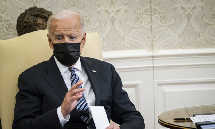 President Joe Biden speaks to the media during a meeting with the Congressional Black Caucus in the Oval Office at the White House in Washington, on April 13, 2021. (Pete Marovich/Pool/Getty Images)