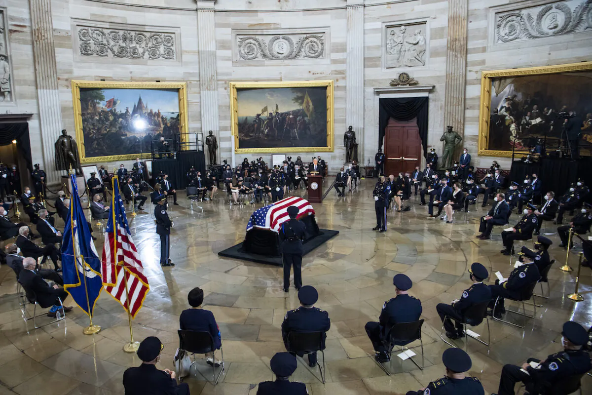 President Joe Biden speaks during the service for U.S. Capitol Officer William Evans, as his remains lie in honor in the Capitol Rotunda in Washington, on April 13, 2021. (Tom Williams/CQ Roll Call/Pool)
