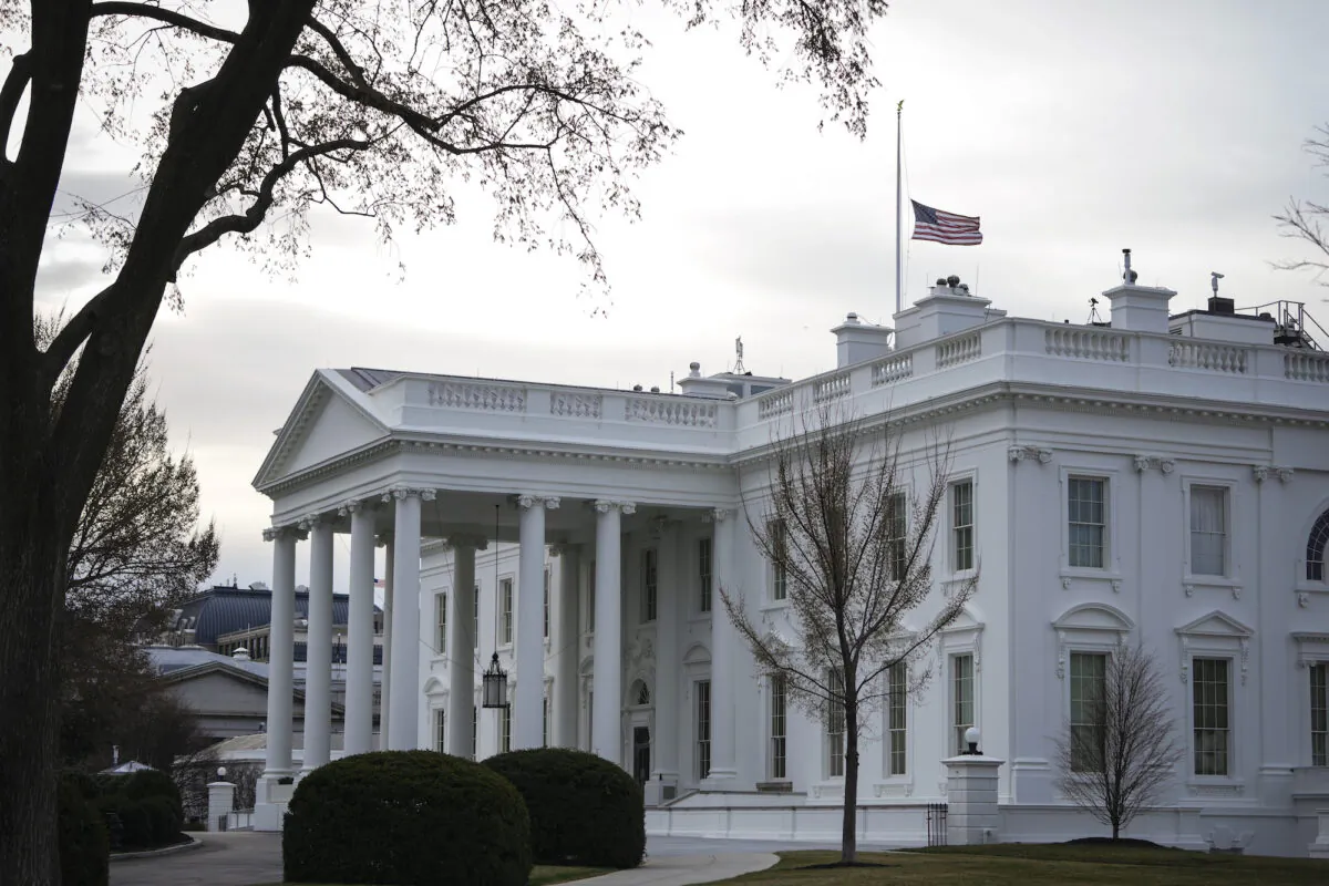 The American flag flies at half-staff at the White House in honor of Atlanta shooting victims in Washington, on March 19, 2021. (Drew Angerer/Getty Images)