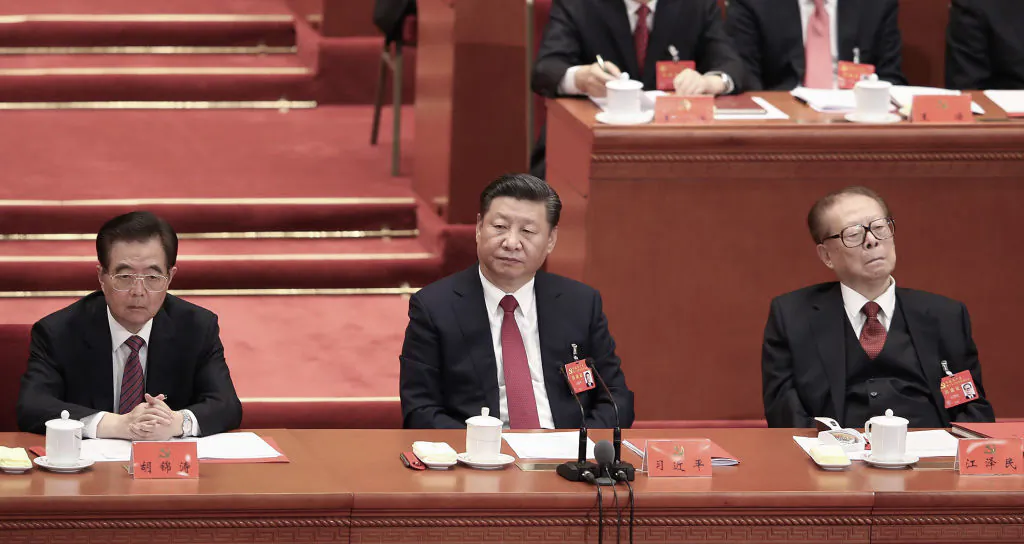 (L-R) China's former leader Hu Jintao, Xi Jinping, and former leader Jiang Zemin attend the closing of the 19th Communist Party Congress at the Great Hall of the People in Beijing, China on Oct. 24, 2017. (Lintao Zhang/Getty Images)