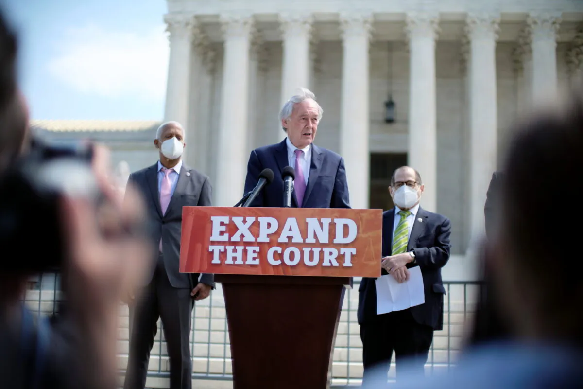 Sen. Ed Markey (D-Mass.), center, and Reps. Hank Johnson (D-Ga.), and Jerrold Nadler (D-N.Y.), introduce a bill that would add four seats to the Supreme Court, in Washington on April 15, 2021. (James Lawler Duggan/Reuters)
