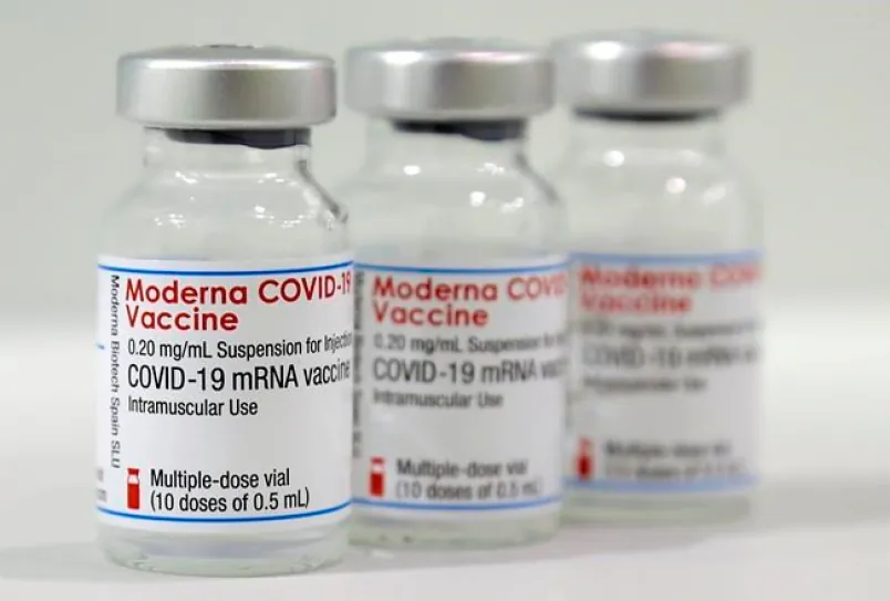 Three vials of the Moderna COVID-19 vaccine in a vaccination center at the Velodrome-Stadium in Berlin on Feb. 17, 2021. (The Canadian Press/AP/Michael Sohn, pool)