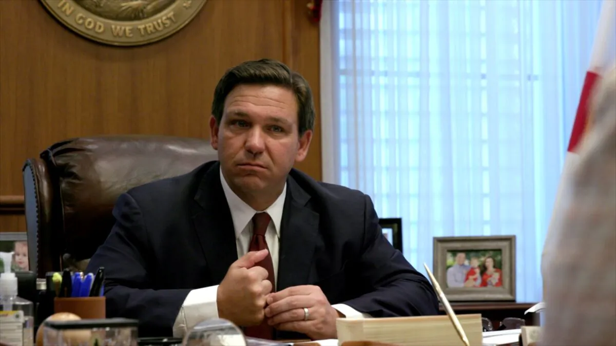 A screenshot of Floridа Gov. Ron DeSantis listening to a report from a member of his administration at the governor's office in Tallahassee, Fla., on April 1, 2021. (Screenshot via The Epoch Times)