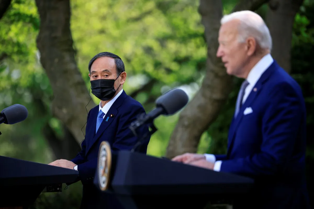 Japan's Prime Minister Yoshihide Suga and U.S. President Joe Biden hold a joint news conference in the Rose Garden at the White House in Washington, on April 16, 2021. (Tom Brenner/Reuters)