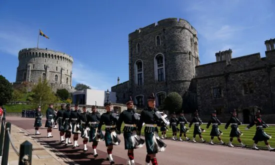 Queen Elizabeth Stands Alone as Prince Philip Is Laid to Rest